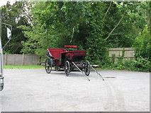 SU9635 : Horseless carriage in the Swan Inn car park by Dave Spicer