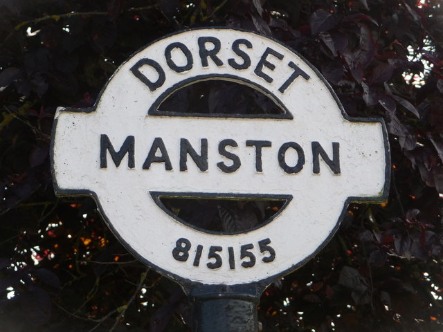 Manston: detail of finger-post finial