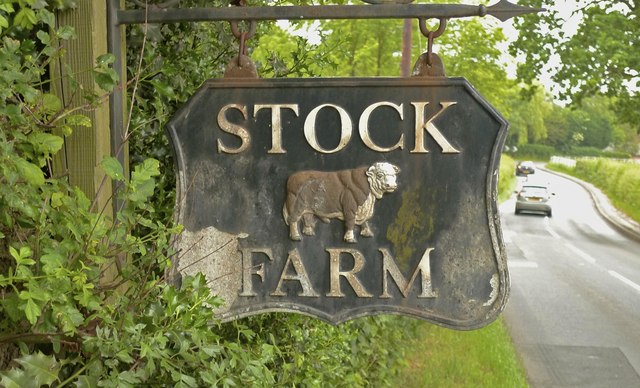 Roadway and sign outside Stock Farm, Ashley, Cheshire