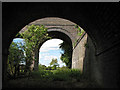 Under the railway bridges east of Saxby Junction