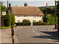 ST8211 : Shillingstone: thatched cottage on the main road by Chris Downer