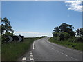 The A697 passing Hatchednize Farm