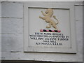 Description on plaque above Almshouses