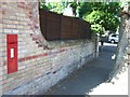 Wall and Victorian postbox in Hanover Road, Weymouth