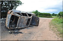 SS9310 : Mid Devon : Burnt Out Car by Lewis Clarke