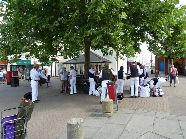 Morris Dancers preparing to perform in the High Street