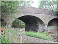 Road bridge over railway at Hawes station