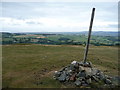 SH9771 : Pole and cairn on Mynydd y Gaer by Jeremy Bolwell