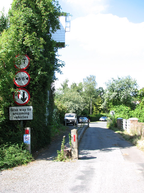 Narrow road past Ellingham Mill