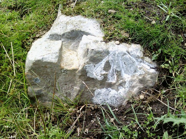 Benchmark on roadside rock