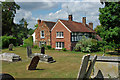 Cottages by Slinfold churchyard