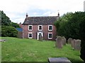 Churchyard and village house