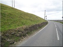SO1004 : Old dry stone retaining wall above Fochriw by CHARLES GORDON CLARK