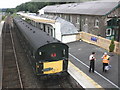 Train for Meldon, waits for the off, at Okehampton