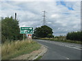 Pylons by the A46 near a service area