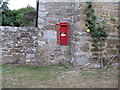 Victorian postbox on side of house in Little Bognor