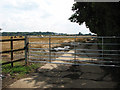 Gated private farm track south of St Thomas Lane