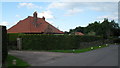 Scaffolding on a bungalow in The Street