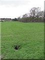 Hole in a field, East Gartmillan