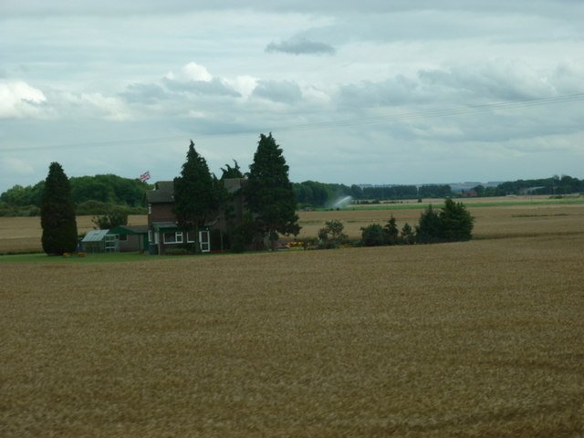 A house in a middle of a field