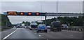 TQ0167 : M25: gantry in the middle of junction 12 by N Chadwick