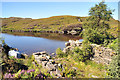 NM6576 : Boathouse remains on Loch na Bairness by Steven Brown