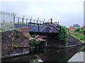 Towpath bridge over entrance to former brickworks basin at Izon Old Turn