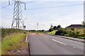 Pylons and speed limit signs approaching Quarter