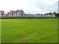 New houses across new cemetery