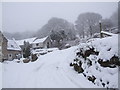 Ty Uchaf Farmhouse in the snow