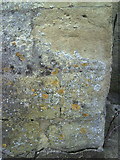 SP7408 : Benchmark on tower buttress of St Mary the Virgin Church by Roger Templeman