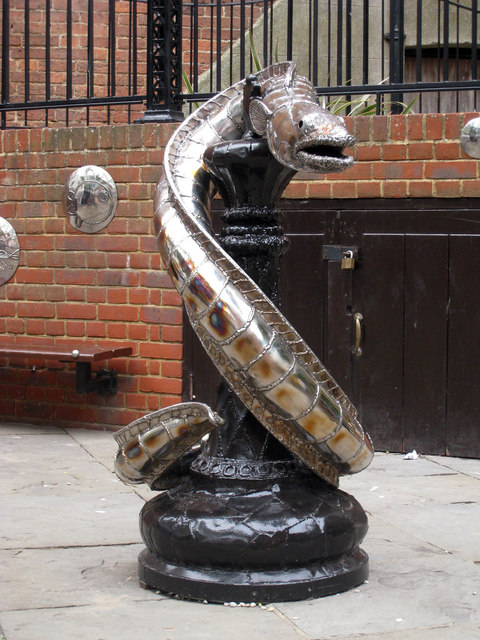 Snake on Pawn Sculpture