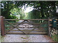 Gate with plaque commemorating the end of the West Somerset mineral line