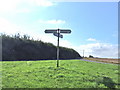 Signpost at the crossroads of Almshouse Road and Housefield Road