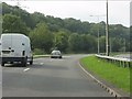 Wooded bend on Ringland Way (A48)