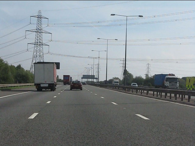 M4 Motorway - power lines crossing on... © J Whatley cc-by-sa/2.0 ...