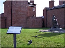 SJ3389 : Sculpture depicting emigrants from Liverpool by Raymond Knapman