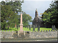 SJ0309 : War Memorial and St Erfyl's Church by John Firth