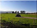 B8201 : Tractor in field, Ballynacarrick by Kenneth  Allen