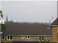 Across rooftops towards City