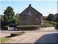 Gable end of medieval stone cottage at Holland Lees