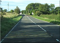 NX9069 : Approaching Beeswing on the A711 by Ann Cook