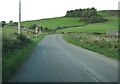 Warnings of a narrow bridge and a sharp bend on the A711