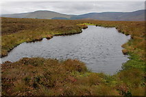 NT2130 : Lochan on the col below Horse Hope Hill by Jim Barton