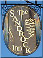 The Sandrock Inn sign