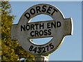ST8427 : Motcombe: detail of North End Cross signpost by Chris Downer