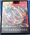 Sign for the Three Horseshoes