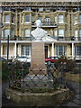 Memorial to Edward Welby Pugin with Victoria Parade in the background