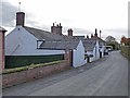 NY5061 : Roadside cottages at the east end of Irthington by Oliver Dixon