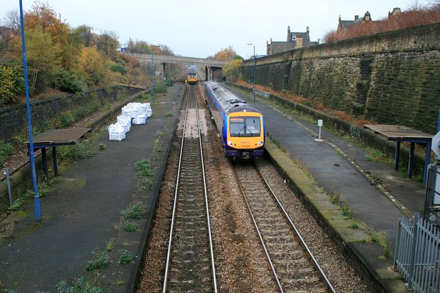 Trains passing through the former Brightside station